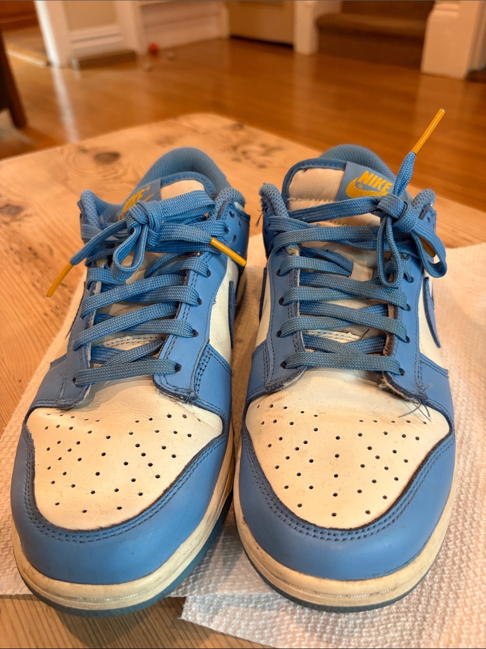 Nike size 6.5 Low-Top Sneakers - Light Blue, White with Yellow Accents.